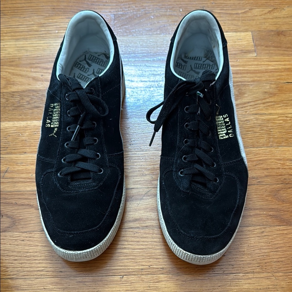 Puma Black and Gold Sneakers with Skateboard-Inspired Design